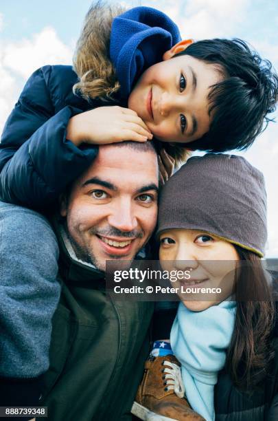 happy together - family vertical stock pictures, royalty-free photos & images