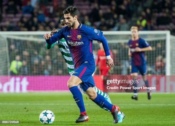 Andre Filipe Tavares Gomes of FC Barcelona competes for the ball with William Carvalho of Sporting CP during the UEFA Champions League 2017-18 match...