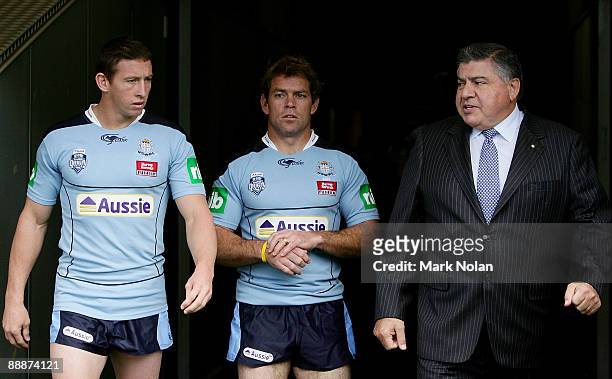 Kurt Gidley, Brett Kimmorley and John Symond walk out for a team photo during a New South Wales State of Origin media session at ANZ Stadium Stadium...