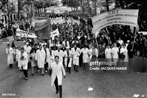 French medical staff of hospitals on strike take part in the big demonstration, called by the CGT trade union, in Paris, on May 29, 1968 during the...