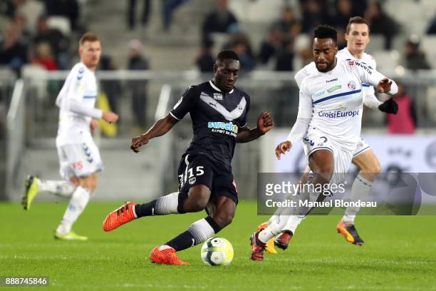 Alexandre Mendy of Bordeaux and Yoann Salmier of Strasbourg during the Ligue 1 match between FC Girondins de Bordeaux and Strasbourg at Stade Matmut...