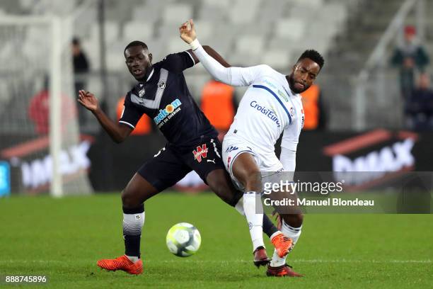 Alexandre Mendy of Bordeaux and Yoann Salmier of Strasbourg during the Ligue 1 match between FC Girondins de Bordeaux and Strasbourg at Stade Matmut...
