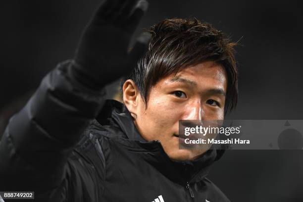 Kento Misao of Japan applauds supporters after his side's 1-0 victory in the EAFF E-1 Men's Football Championship between Japan and North Korea at...