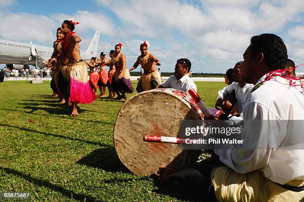 Tongan dancers perform for the arrival of New Zealand Prime Minister John Key at the Fua'amotu International Airport on July 7, 2009 in Nuku'alofa,...