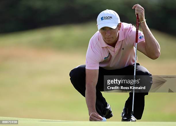 Lloyd Saltman of Scotland on the 4th green during local final qualifing for the 2009 Open Championship at Kilmarnock on July 7, 2009 in Troon,...