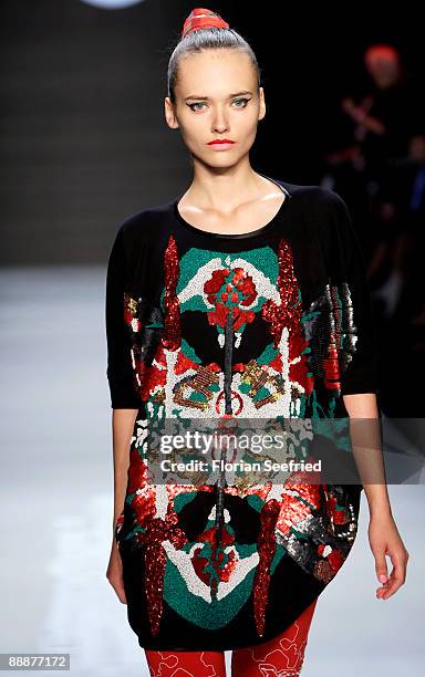 Model walks down the runway at the 'Smililener Show' during the Mercedes-Benz Fashion Week Berlin S/S 2010 at Bebelplatz on July 3, 2009 in Berlin,...