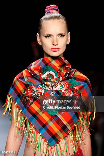 Model walks down the runway at the 'Smililener Show' during the Mercedes-Benz Fashion Week Berlin S/S 2010 at Bebelplatz on July 3, 2009 in Berlin,...