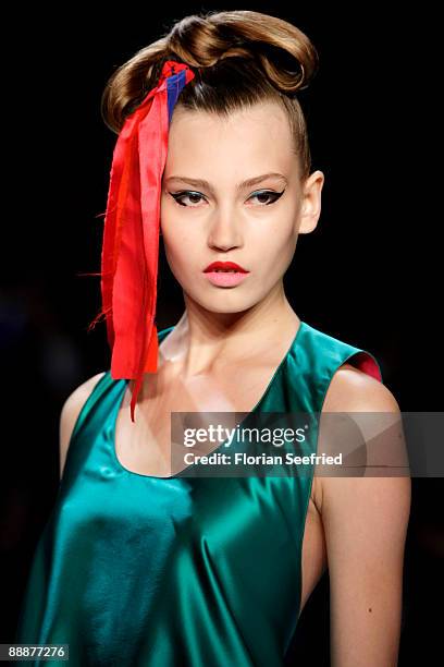 Model walks down the runway at the 'Smililener Show' during the Mercedes-Benz Fashion Week Berlin S/S 2010 at Bebelplatz on July 3, 2009 in Berlin,...