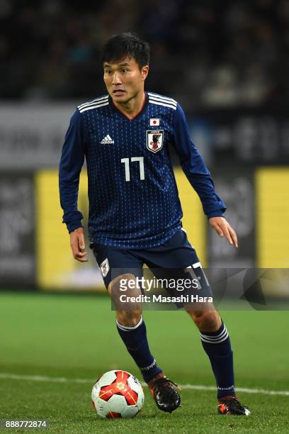 Yasuyuki Konno of Japan in action during the EAFF E-1 Men's Football Championship between Japan and North Korea at Ajinomoto Stadium on December 9,...
