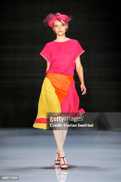 Model walks down the runway at the 'Smililener Show' during the Mercedes-Benz Fashion Week Berlin S/S 2010 at Bebelplatz on July 3, 2009 in Berlin,...