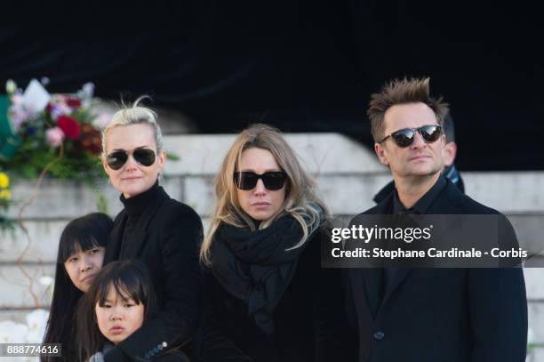 Jade Hallyday, Laetitia Hallyday, Joy Hallyday, Laura Smet and David Hallyday during Johnny Hallyday's Funeral Procession at Eglise De La Madeleine...