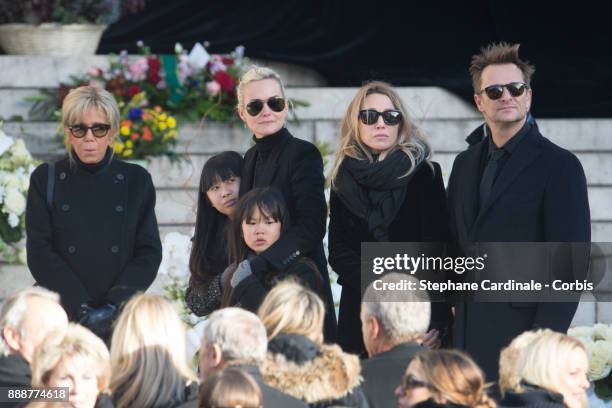 Brigitte Macron, Jade Hallyday, Laetitia Hallyday, Joy Hallyday, Laura Smet and David Hallyday during Johnny Hallyday's Funeral Procession at Eglise...