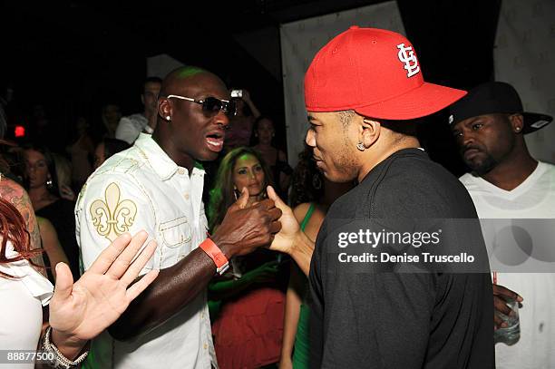 Antonio Tarver and Nelly attend Jet nightclub at The Mirage Hotel and casino Resort on July 6, 2009 in Las Vegas, Nevada.