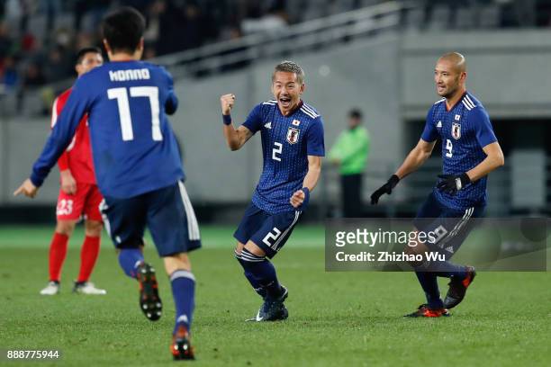 Ideguchi Yosuke of Japan celebrates scoring during the EAFF E-1 Men's Football Championship between Japan and North Korea at Ajinomoto Stadium on...