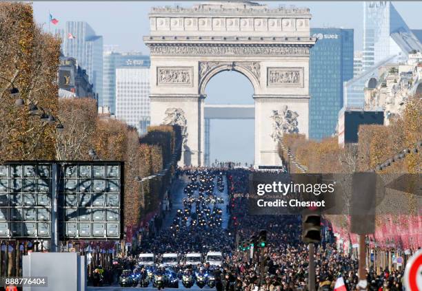 Johnny Hallyday's Funeral Procession on the Champs Elysees Avenue on December 9, 2017 In Paris, France. France pays tribute to Johnny Hallyday, the...