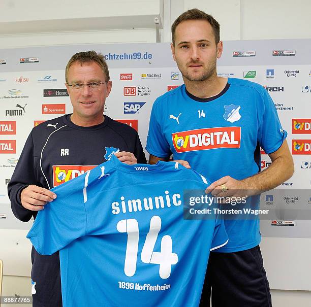 Josip Simunic and headcoach Ralf Rangnick pose during the 1899 Hoffenheim press conference at the Hoffenheim training ground on July 7, 2009 in...