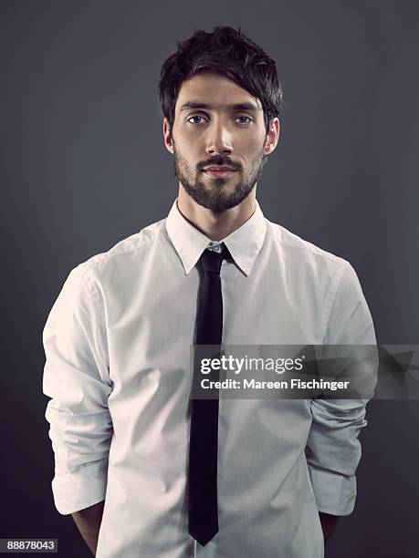 portrait of young man with business clothing - mareen fischinger foto e immagini stock