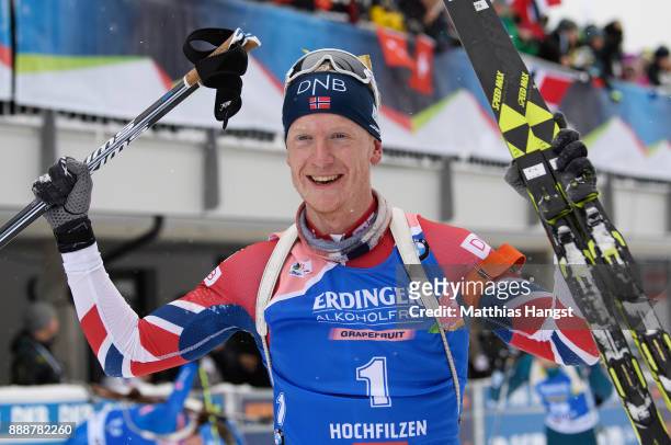 Johannes Thingnes Boe of Norway celebrates after winning the 12.5 km Men's Pursuit during the BMW IBU World Cup Biathlon on December 9, 2017 in...