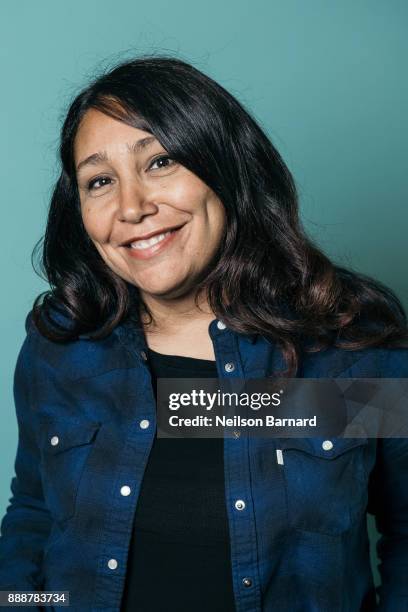 Haifaa Al Mansour poses during a portrait session during the 14th annual Dubai International Film Festival held at the Madinat Jumeriah Complex on...