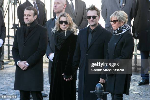 French Republic President Emmanuel Macron, Laura Smet, David Hallyday and Brigitte Macron are seen during Johnny Hallyday's funeral at Eglise De La...