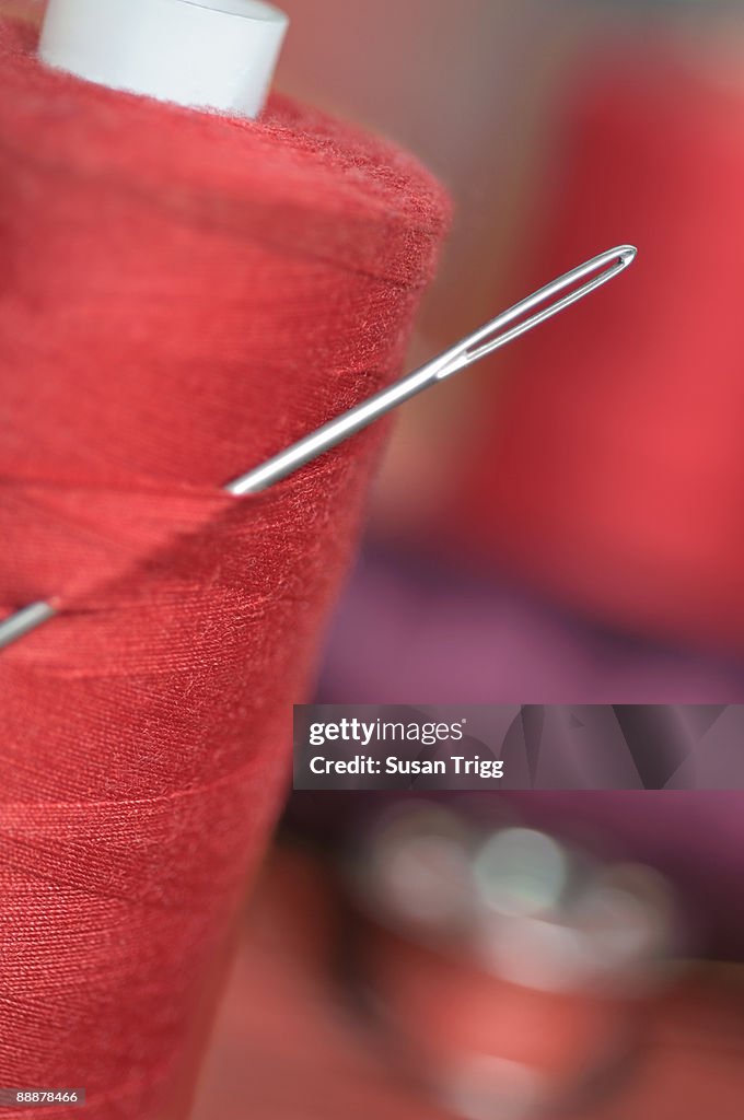 Red Sewing Thread High-Res Stock Photo - Getty Images