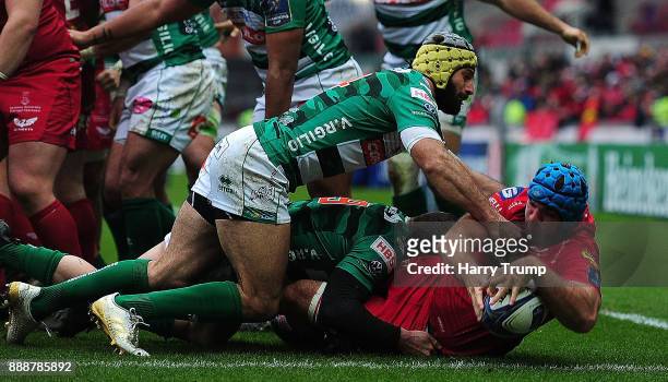 Tadhg Beirne of Scarlets goes over for his sides third try during the European Rugby Champions Cup match between Scarlets and Benetton Rugby at Parc...