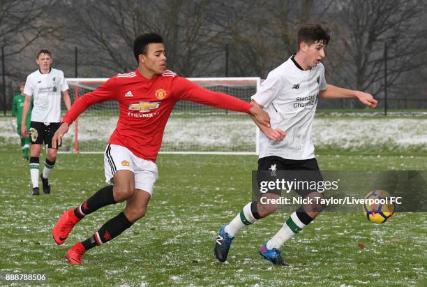 Anthony Glennon of Liverpool and Mason Greenwood of Manchester United in action during the Manchester United v Liverpool U18 Premier League game at...