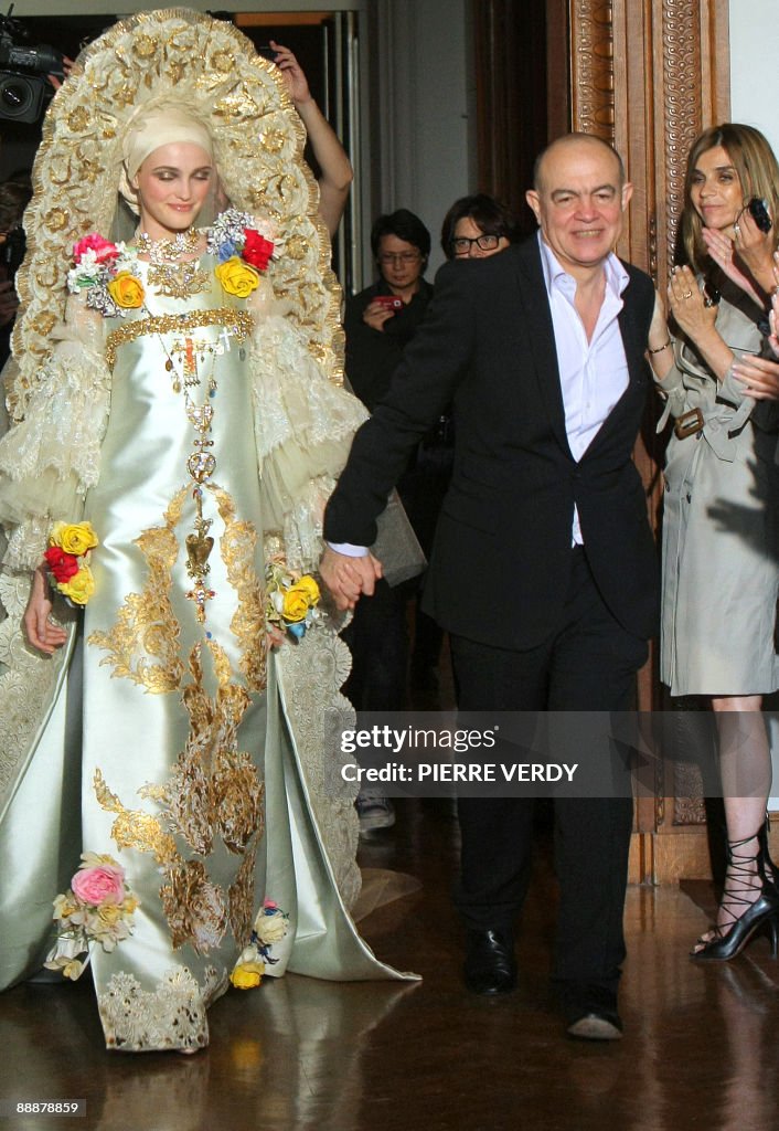 French designer Christian Lacroix ackowl