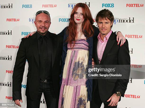 Fashion designer Alex Perry, model Alice Burdeu and Jonathon Pease arrive for the final of Australia's Next Top Model at Luna Park on July 7, 2009 in...