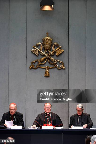 Cardinal Paul Josef Cordes, Cardinal Renato Martino and Jesuit Federico Lombardi attend the presentation of the new Encyclical letter Caritas et...