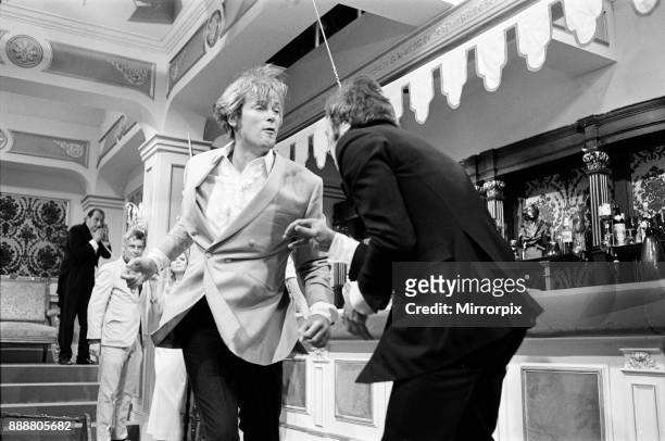 Roger Moore and Tony Curtis fight with each other on the set of The Persuaders! at Pinewood Film Studios, Iver, Bucks. Roger plays an English Lord,...