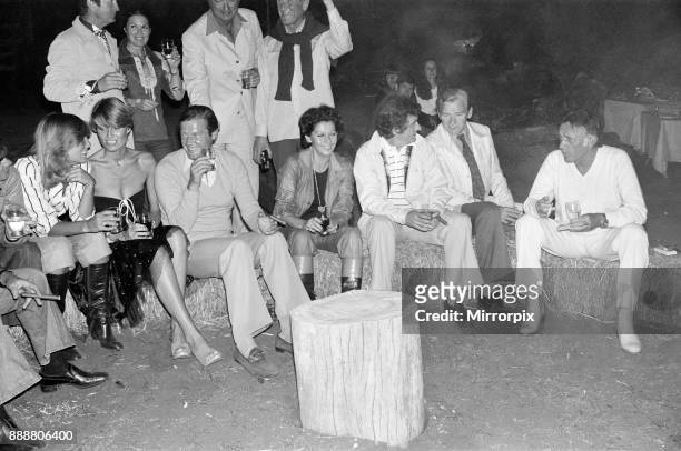 Roger Moore's 50th Birthday Party in the bush near Tshipise, South Africa, during the filming of his latest film 'Wild Geese.' Suzy Miller, Roger...