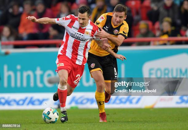 Steven Skrzybski of 1 FC Union Berlin and Paul Seguin of SG Dynamo Dresden during the Second Bundesliga match between Union Berlin and Dynamo Dresden...