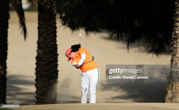 Angel Yin of the United States plays her second shot on the par 4, 14th hole during the final round of the 2017 Dubai Ladies Classic on the Majlis...