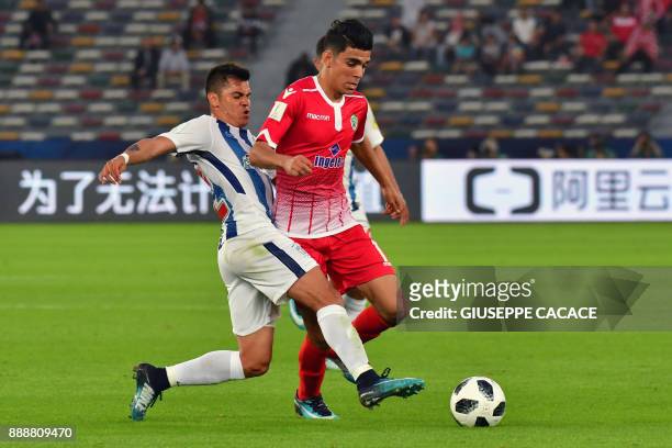 Mexican club CF Pachuca's Mexican defender Emmanuel Garcia vies for the ball against Moroccan club Wydad Casablanca's Moroccan forward Achraf...