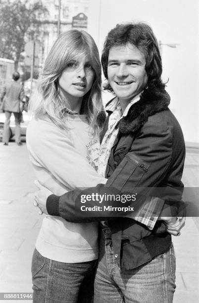 Britiain's World Motorcycle racing Champion Barry Sheene pictured with girlfriend Stephanie McLean, discussing the possibility of becoming a tex...