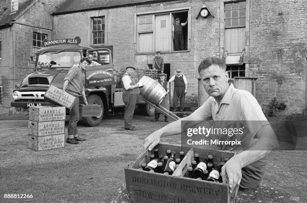 Master brewer Claude Arkwell seen here with the team at the Donnington Brewery, Stow on the Wold, 5th July 1963.