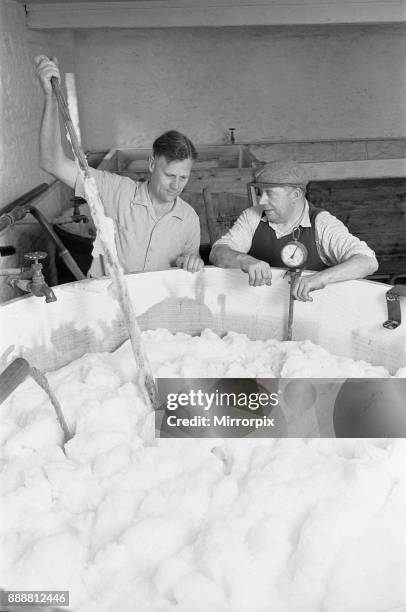 Brewer Claude Arkwell seen here testing the Ale Fermenter at the Donnington Brewery, Stow on the Wold, 5th July 1963.