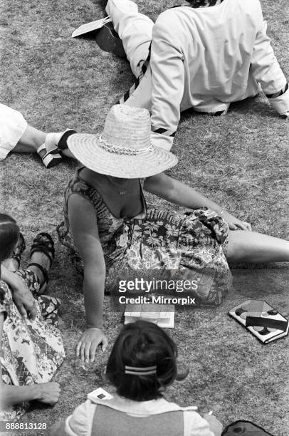 People enjoying the Henley Regatta. River Thames, Henley-on-Thames, Oxfordshire. June 1976.