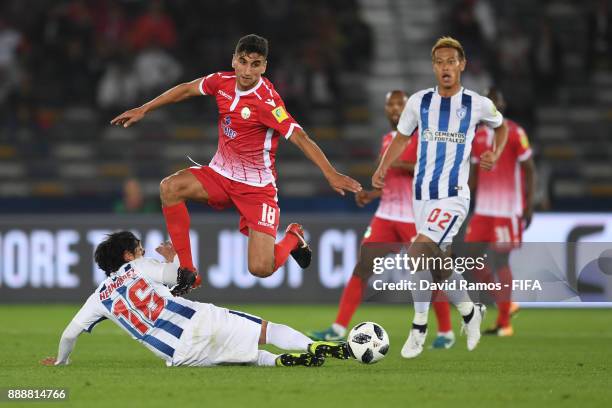 Jorge Hernandez of Pachuca tackles Walid El Karti of Wydad Casablanca during the FIFA Club World Cup match between CF Pachuca and Wydad Casablanca at...