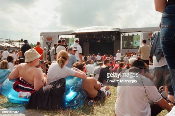 Crowds enjoying the music at the V Festival, Weston Park, 20th August 2000.
