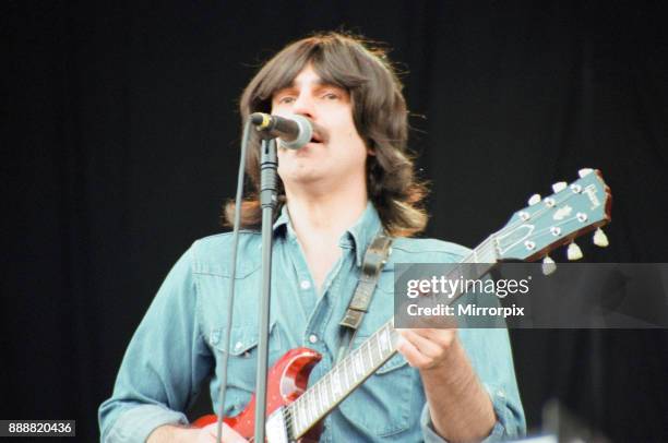 The Bootleg Beatles performing at the V Festival, Weston Park, 20th August 2000.