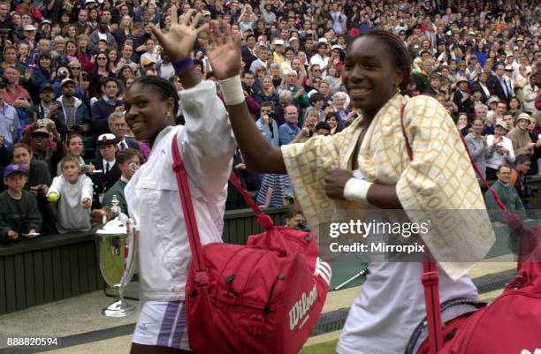 Venus Williams and Serena Williams win doubles at wimbledon July 2000 Venus and Serena Williams leave centre court after winning the women's doubles...