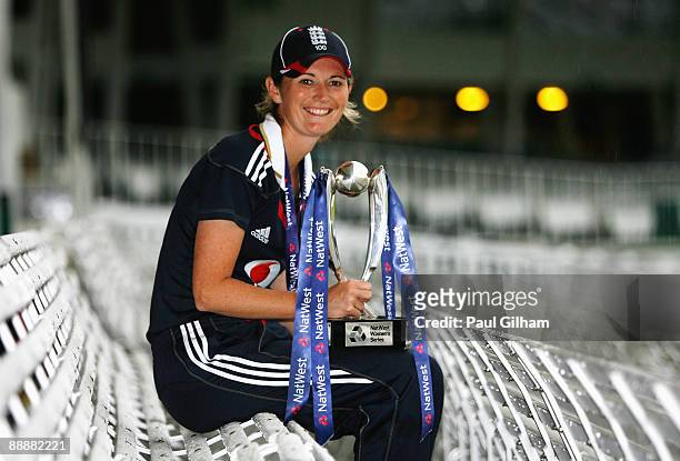 England captain Charlotte Edwards poses with the Natwest Trophy after England's series victory after play was abandoned due to a heavy thunder and...