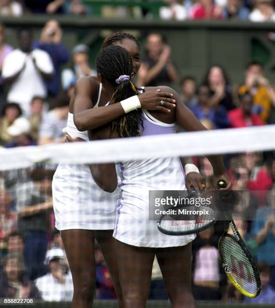 Venus Williams and Serena Williams win doubles at wimbledon July 2000 Venus and Serena Williams celebrate winning the women's doubles final after...