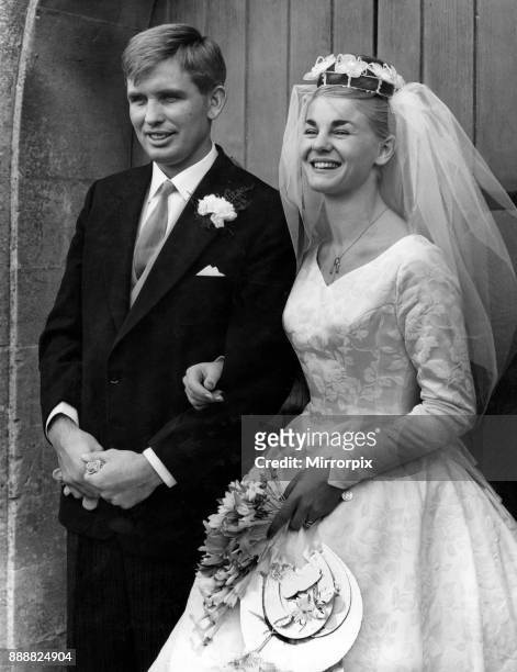 Former Welsh international and Llanelli rugby star Terry Davies, of Bynea, and his smiling bride, Miss Gillian James, after their wedding at St....