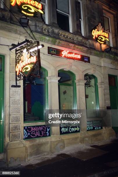 Exterior night shot of Hooters bar in Driffield. Photographed in relation to an alleged arrest of footballer Curtis Woodhouse, 24th January 2000.