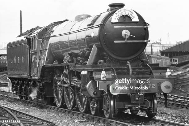 The Flying Scotsman leaves its Tyseley depot for a run to Didcot 15th June 1974. Gentle giant. The mighty Flying Scotsman puffs softly along the...