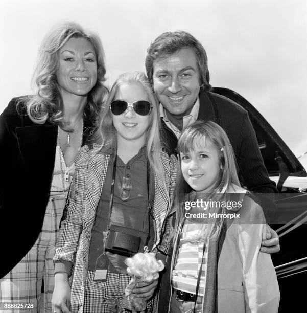 Des O'Connor with his wife Gillian and daughters Tracy and Samantha at the airport, 3rd August 1974.
