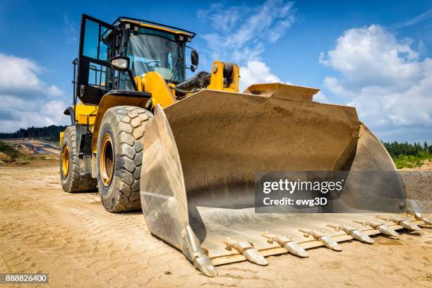 earth mover in a new highway construction s3, poland - bulldozer stock pictures, royalty-free photos & images